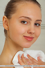 Nalina nalina sensually poses in the bathtub as she scrubs her wet, tight body.