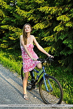 Vittoria a vittoria a shows off her amazing body as she strips by the bike.