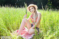 Brunette in the grass